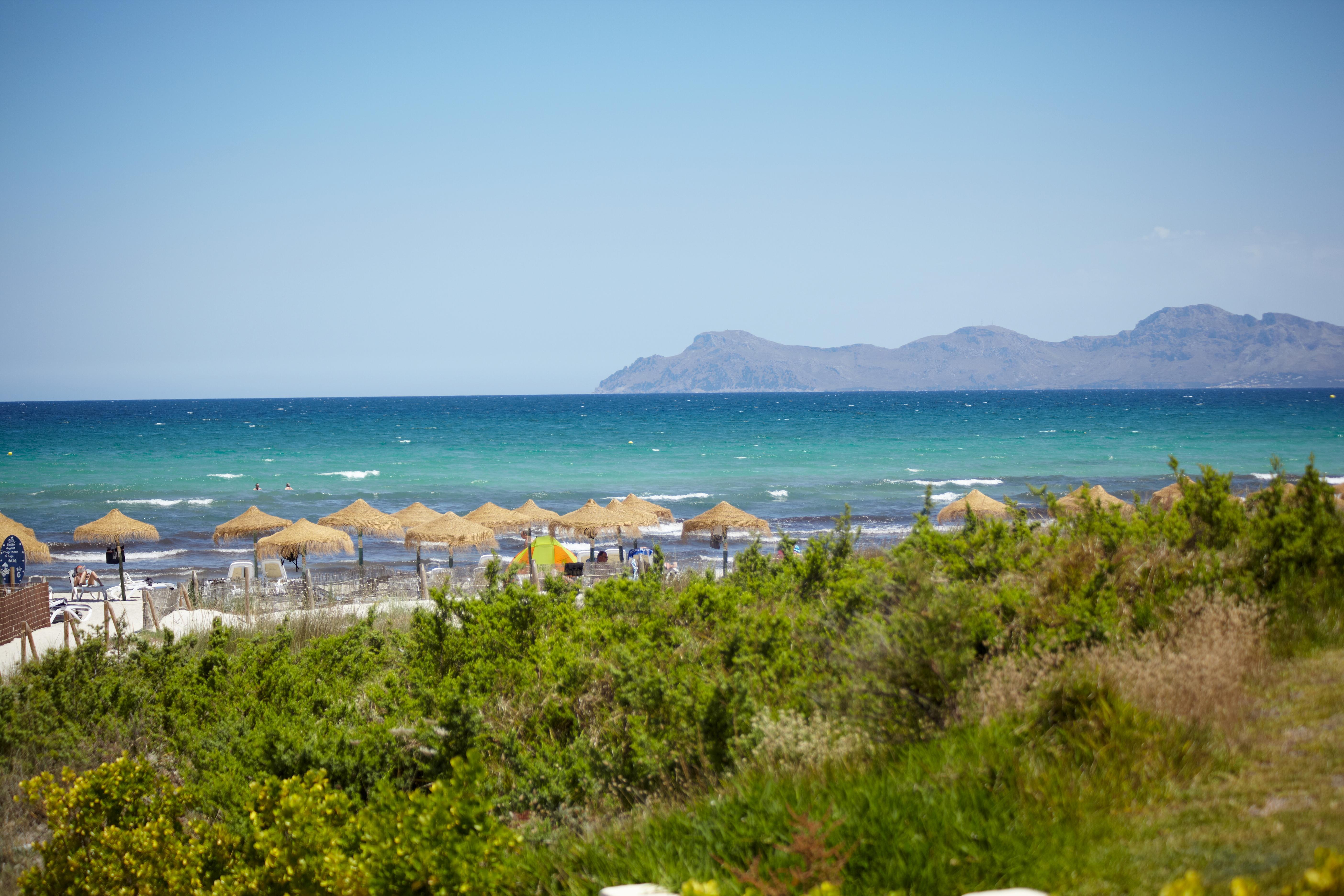 Grupotel Parc Natural & Spa Playa de Muro  Buitenkant foto View of the island of Rhodes from the beach of Marmaris